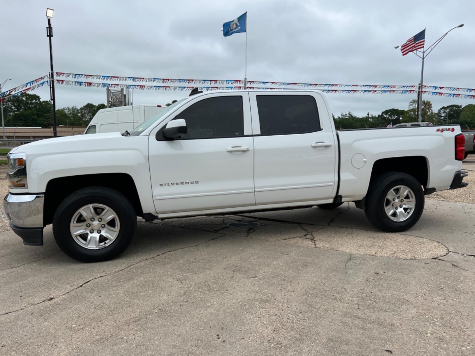 2018 White /Gray Chevrolet Silverado 1500 LT (3GCUKREC2JG) with an 5.3L V8 engine, Automatic transmission, located at 4520 Airline Hwy, Baton Rouge, LA, 70805, (225) 357-1497, 30.509325, -91.145432 - 2018 Chevrolet Silverado Crew Cab LT 4X4 5.3 V8 Gas, 142K Miles, Power Windows, Locks & Mirrors, Cold A/C, Transmission Has 12 Month Warranty, Tow Pkg, Good Tires. FOR INFO PLEASE CONTACT JEFF AT 225 357-1497 CHECK OUT OUR A+ RATING WITH THE BETTER BUSINESS BUREAU WE HAVE BEEN A FAMILY OWNED AND OPE - Photo #1